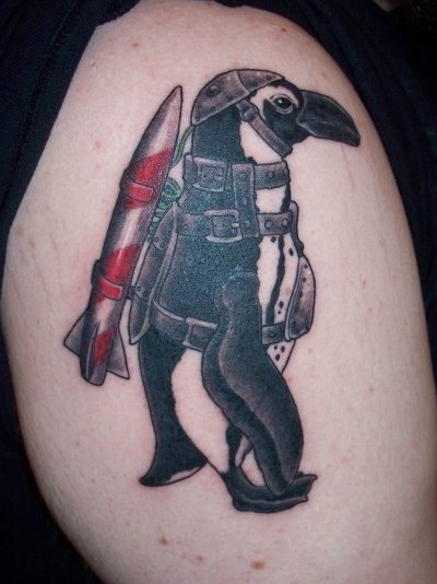 I found this tattoo of one of the penguins from Batman Returns while 