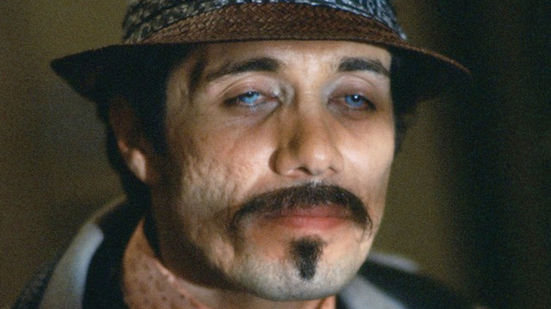 Edward James Olmos as Gaff, appearing pensive in Blade Runner.
