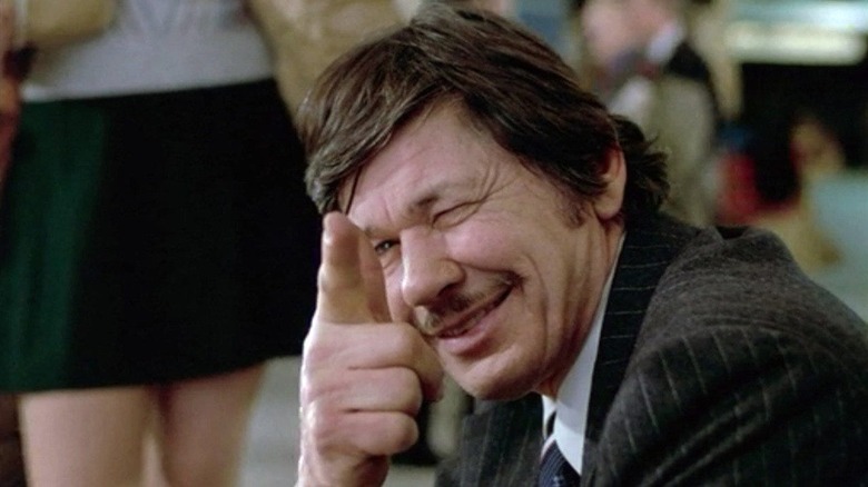 Paul Kersey (Charles Bronson) points finger gun in Death Wish