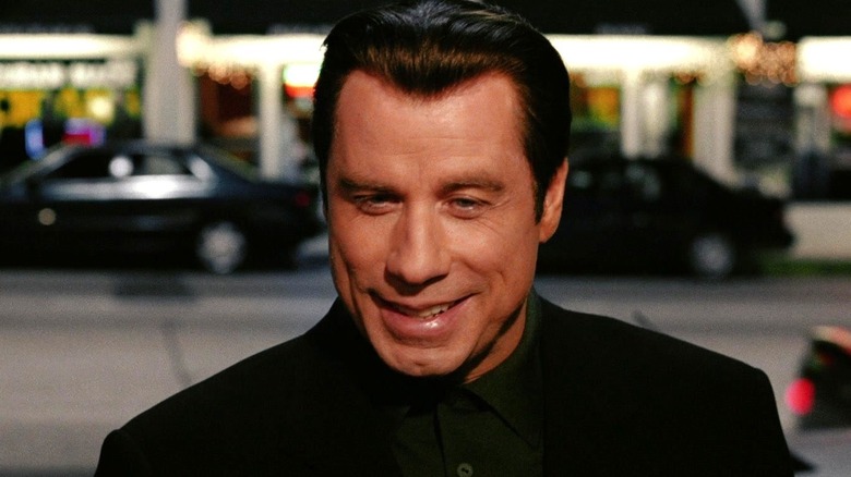 John Travolta as Chili Palmer in Be Cool
