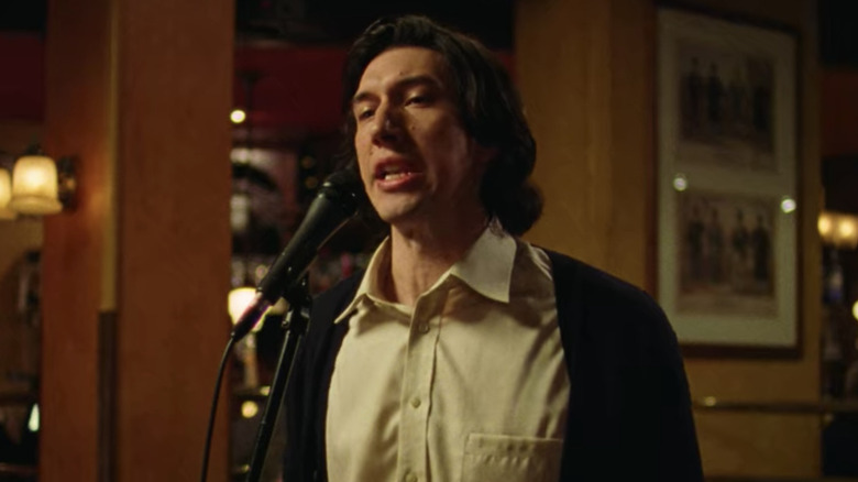 Adam Driver as Charlie singing in a restaurant in Marriage Story