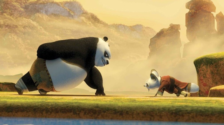 Po (Jack Black) and Master Shifu (Dustin Hoffman) doing one-handed, two-fingered push-ups in Kung Fu Panda (2008)