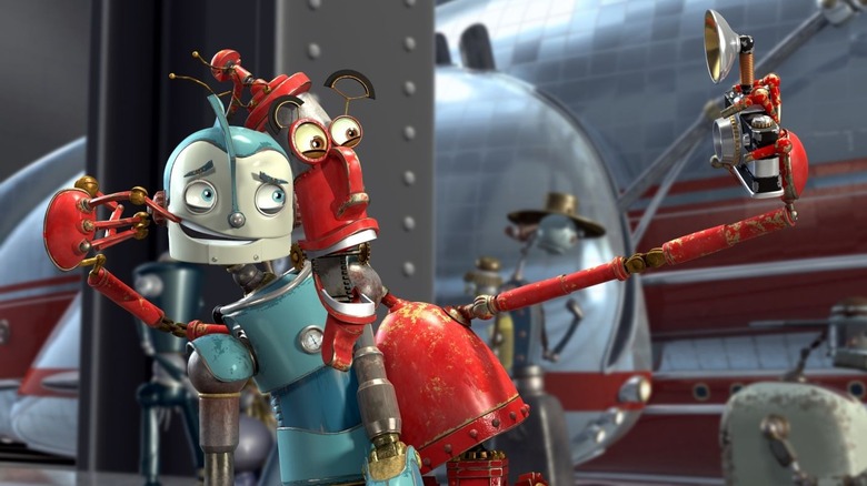 Rodney (Ewan McGregor) and Fender (Robin Williams) take a selfie in Robots (2005)
