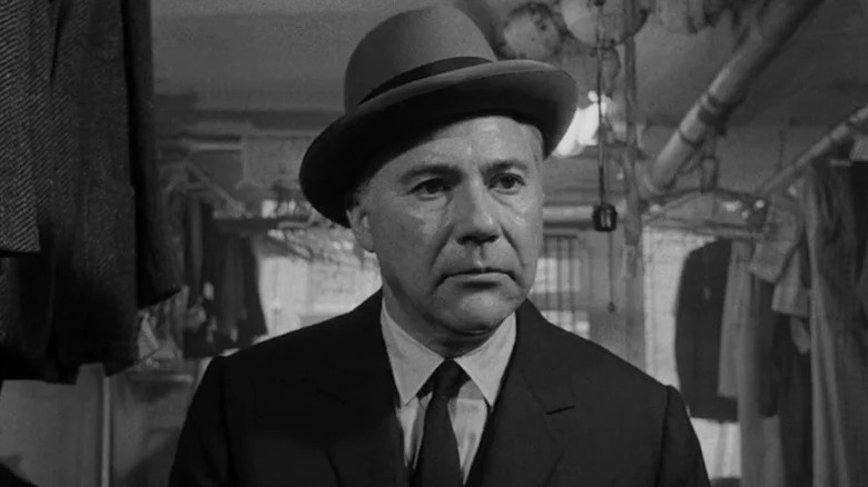 Arthur Hamilton (John Randolph) stares in a dry cleaners in Seconds (1966)