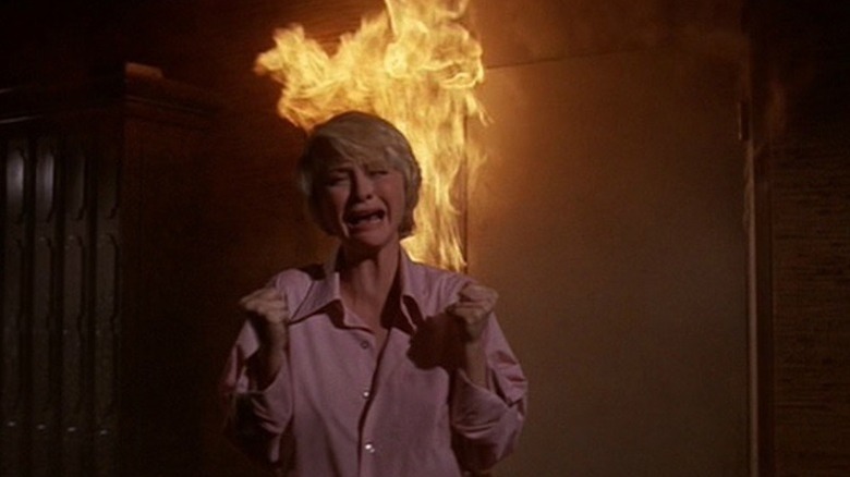 Lorrie (Susan Flannery) screams as a fire rages behind her in The Towering Inferno
