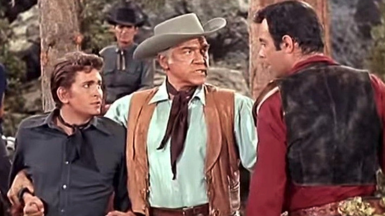 Ben Cartwright (Lorne Greene) confronts cowboys in Bonanza