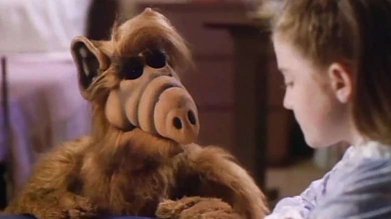 ALF (Paul Fusco) comforts Tiffany (Keri Houlihan) in ALF
