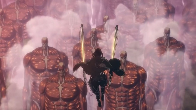 Hange Zoë launches into the air above Titans in Attack on Titan