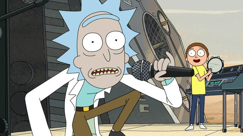 Rick and Morty perform on a large stage in Rick and Morty