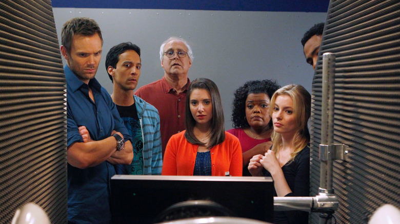 The Greendale Study Group, surrounding a computer monitor on Community