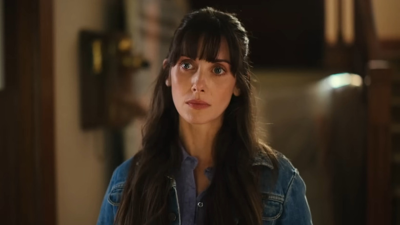 Alison Brie as Millie, looking unhappy in Together