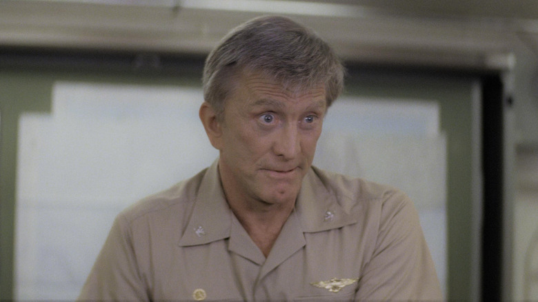 Kirk Douglas as Yelland, doubting the truth in The Final Countdown