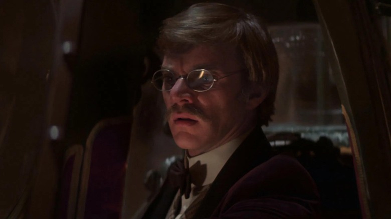 Malcolm McDowell as H.G. Wells, chasing a killer through time in Time After Time
