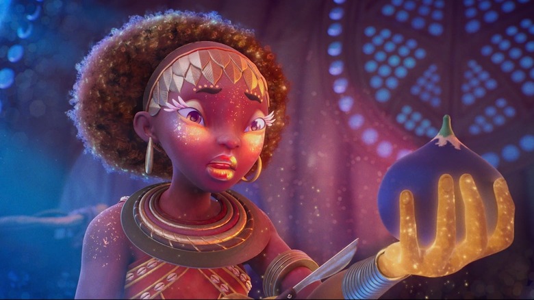 Young girl holding a piece of fruit on Kizazi Moto: Generation Fire