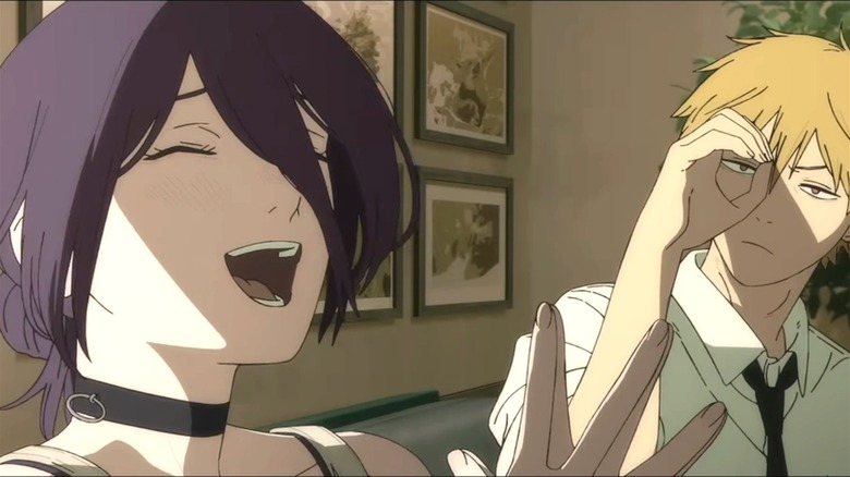 Denji playfully looks at Reze as she laughs in Chainsaw Man - The Movie: Reze Arc