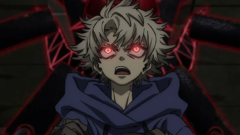 Rudo Surebec with red eyes gaping in Gachiakuta