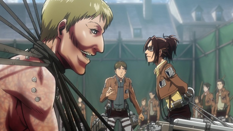Hange Zoe interrogates a captured titan on Attack on Titan