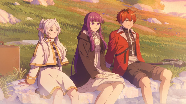 Frieren, Fren, and Stark sitting on a natural ledge in Frieren: Beyond Journey's End