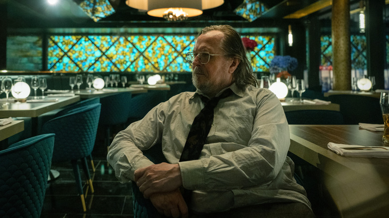 Gary Oldman as Jackson Lamb sat in a bar in Slow Horses Season 5, Episode 2