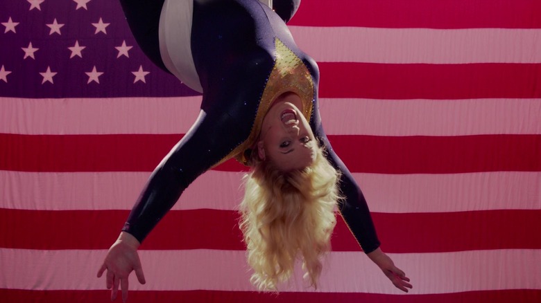 Fat Amy (Rebel Wilson) hangs upside down in Pitch Perfect 2