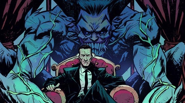 The Absolute Joker sits on a throne in front of his monstrous alter ego