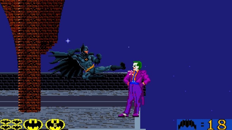 Batman does a jump kick at a smirking Joker in Batman (1991)