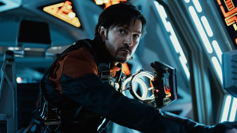 Diego Luna as Cassian Andor seated at the controls of a TIE Fighter in Andor season 2