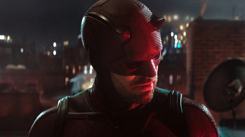 Charlie Cox as Daredevil on a rooftop at night in Daredevil: Born Again