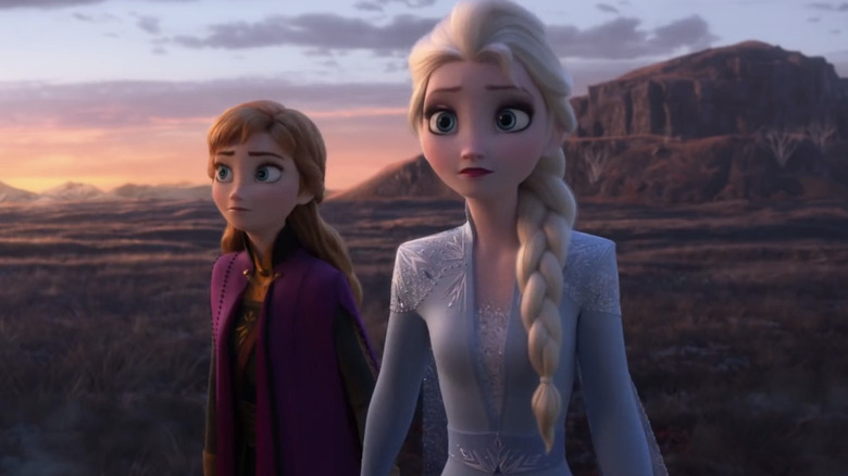 Anna (voiced by Kristen Bell) and Elsa (voiced by Idina Menzel) entering the Enchanted Forest in Frozen II