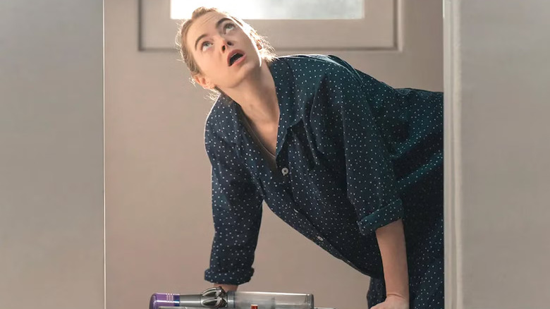 Emma Stone looking up while on all fours as Whitney in The Curse