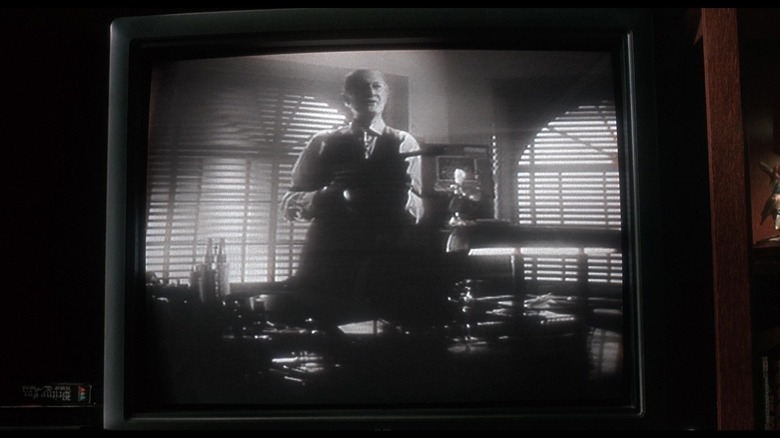 Johnny (Ralph Foody) holding a tommy gun in Angels With Filthy Souls in Home Alone