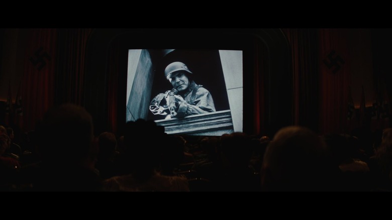 Fredrick Zoller (Daniel Bruhl) aiming rifle in Der Stoltz Der Nation in Inglourious Basterds