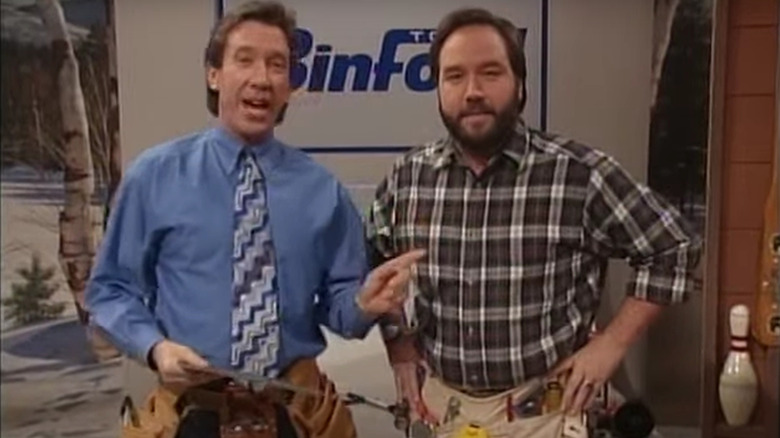Tim Allen as Tim and Richard Karn as Al prepare to demonstrate some tools, on Home Improvement's Tool Time