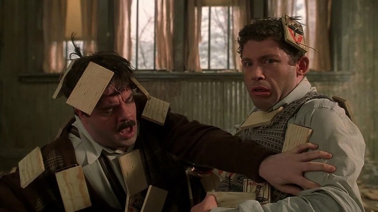 Nathan Lane and Lee Evans as Ernie and Lars Smuntz after falling into a barrage of mouse traps in MouseHunt