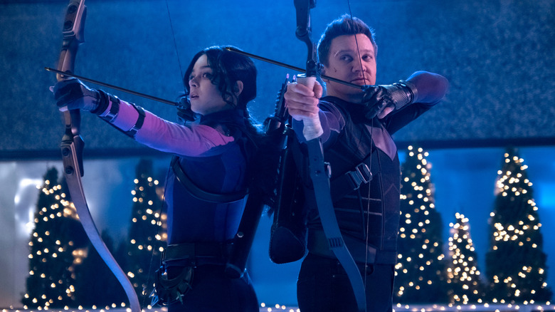 Hailee Steinfeld and Jeremy Renner as Kate and Clint wielding their bows in Hawkeye