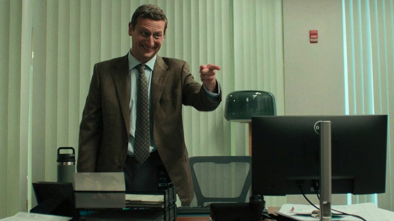 Tim Robinson as Ron pointing at someone outside of his office in The Chair Company