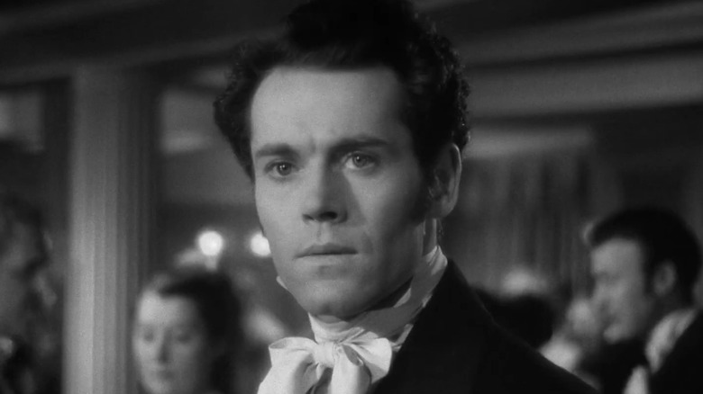 Preston (Henry Fonda) offended at party in Jezebel