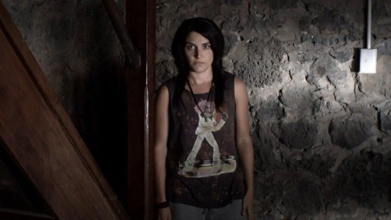 Morgana O'Reilly as Kylie, looking for trouble in Housebound