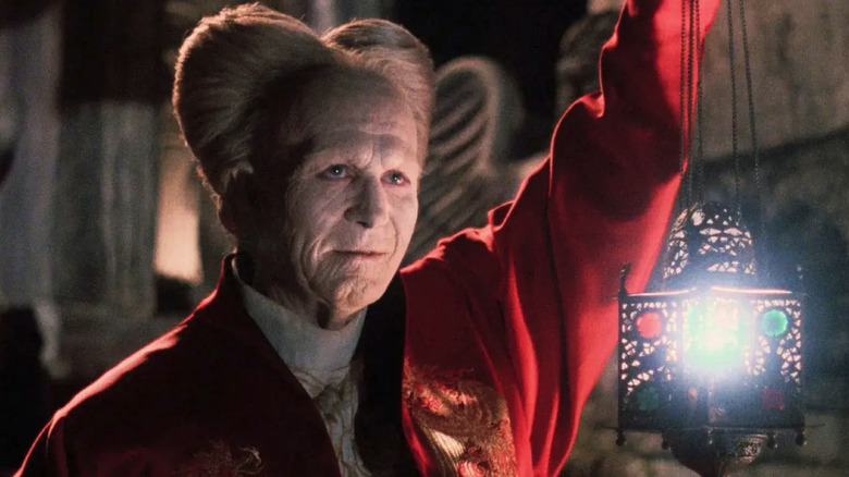An older Dracula (Gary Oldman) holds a lantern in Bram Stoker's Dracula