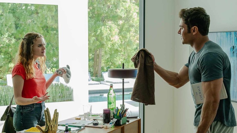 Joey King and Zac Efron as Brooke and Chris fighting in their home in A Family Affair