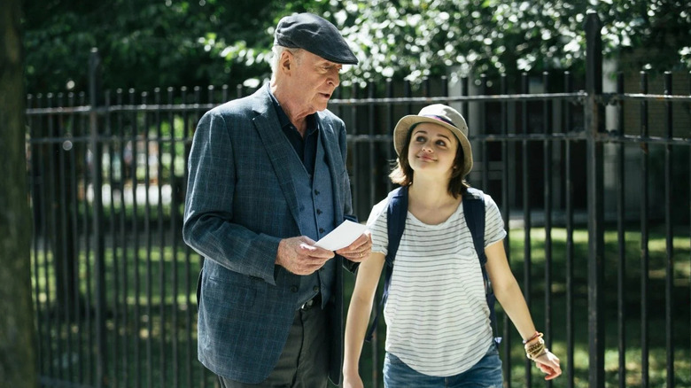 Michael Caine and Joey King as Joe and Brooklyn Harding walking through a park in Going in Style