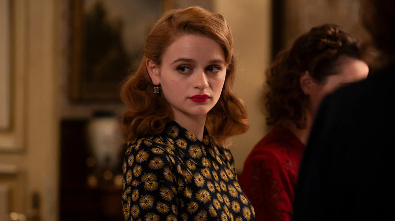 Joey King as Halina Kurc at a party in We Were the Lucky Ones