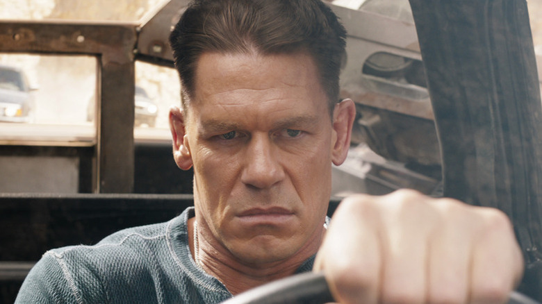Jonh Cena as Jakob Toretto driving angrily in F9: The Fast Saga