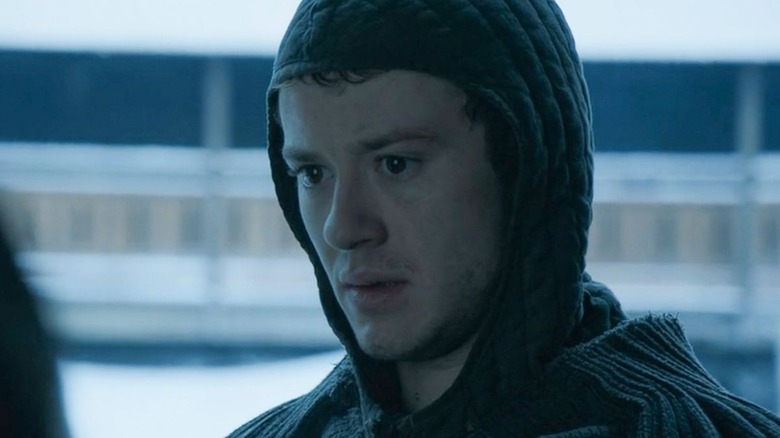 Joseph Quinn as Koner, looking afraid on Game of Thrones