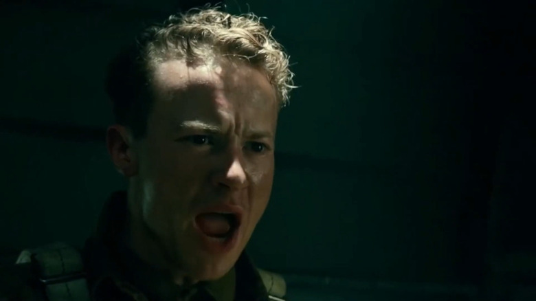 Joseph Quinn as Grunauer, screaming in Overlord
