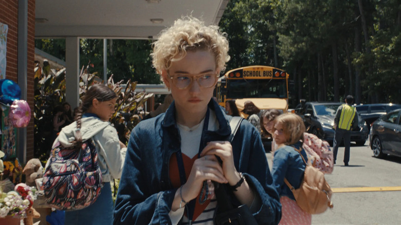 Julia Garner as Juliette Gandy, walking away from school in Weapons