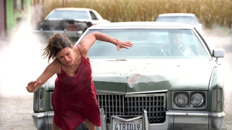 the killer's Cadillac taunting Rhona Mitra as Molly, in Highwaymen