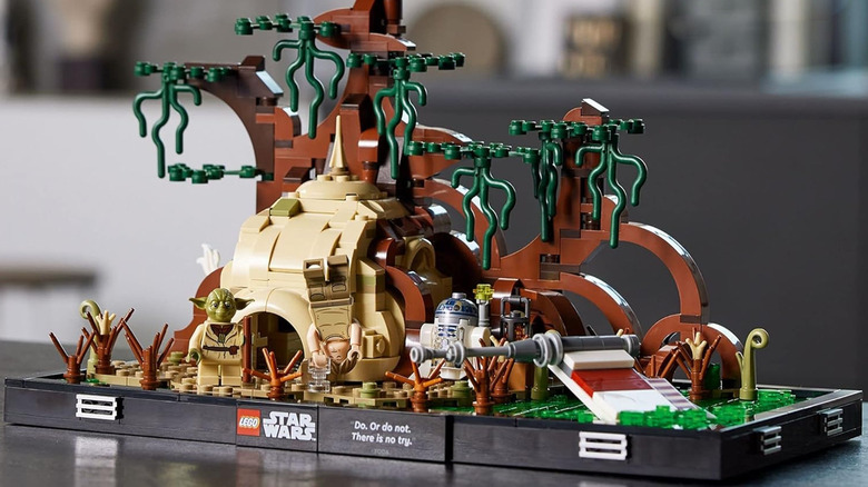 A LEGO model of Luke training with Yoda and R2D2 on Dagobah
