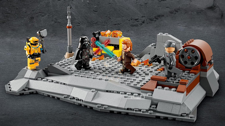 A LEGO of Darth Vader fighting Obi-Wan Kenobi at a mining plant