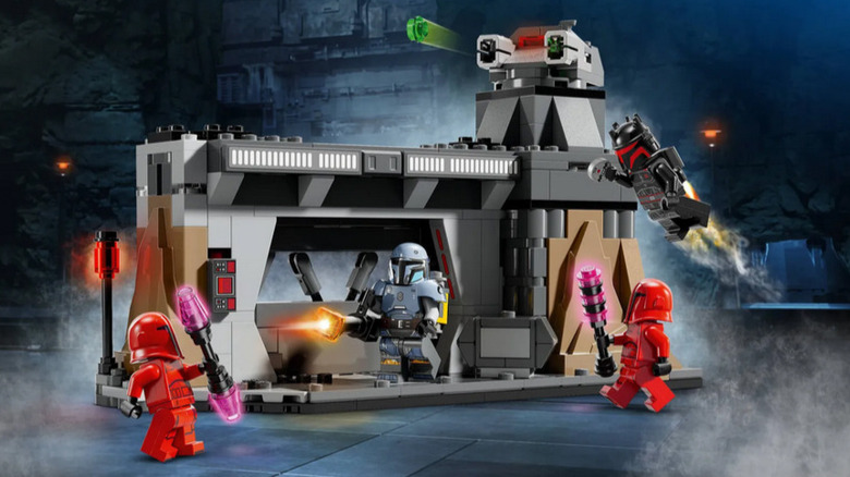 A LEGO model of Paz Vizla and Moff Gideon fighting troopers